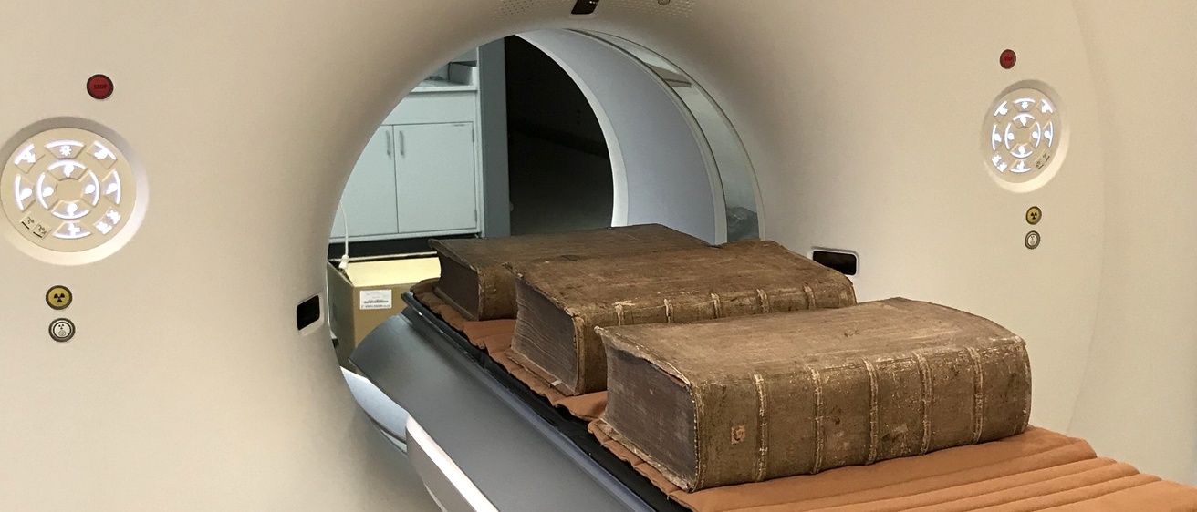 Books in CT scanner bed